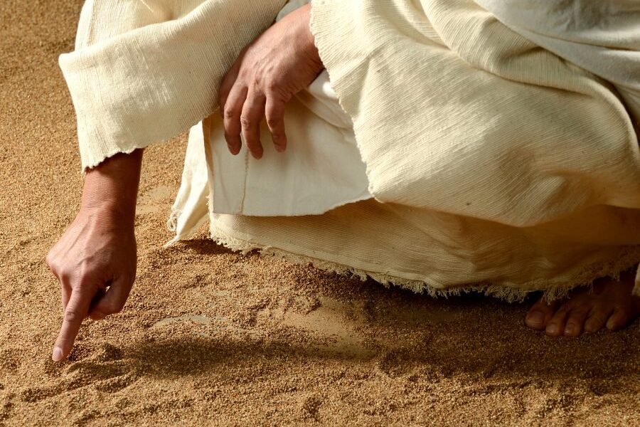 jesus writing in the sand