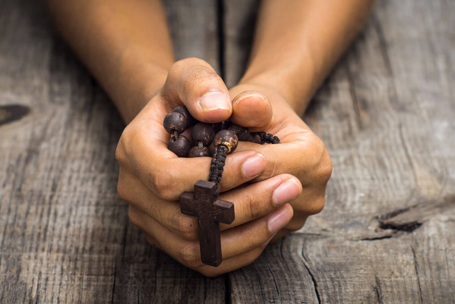 rosary-in-hands